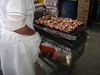 woodgen > Making a living in Santiago's market. Note the shopping trolley BBQ!